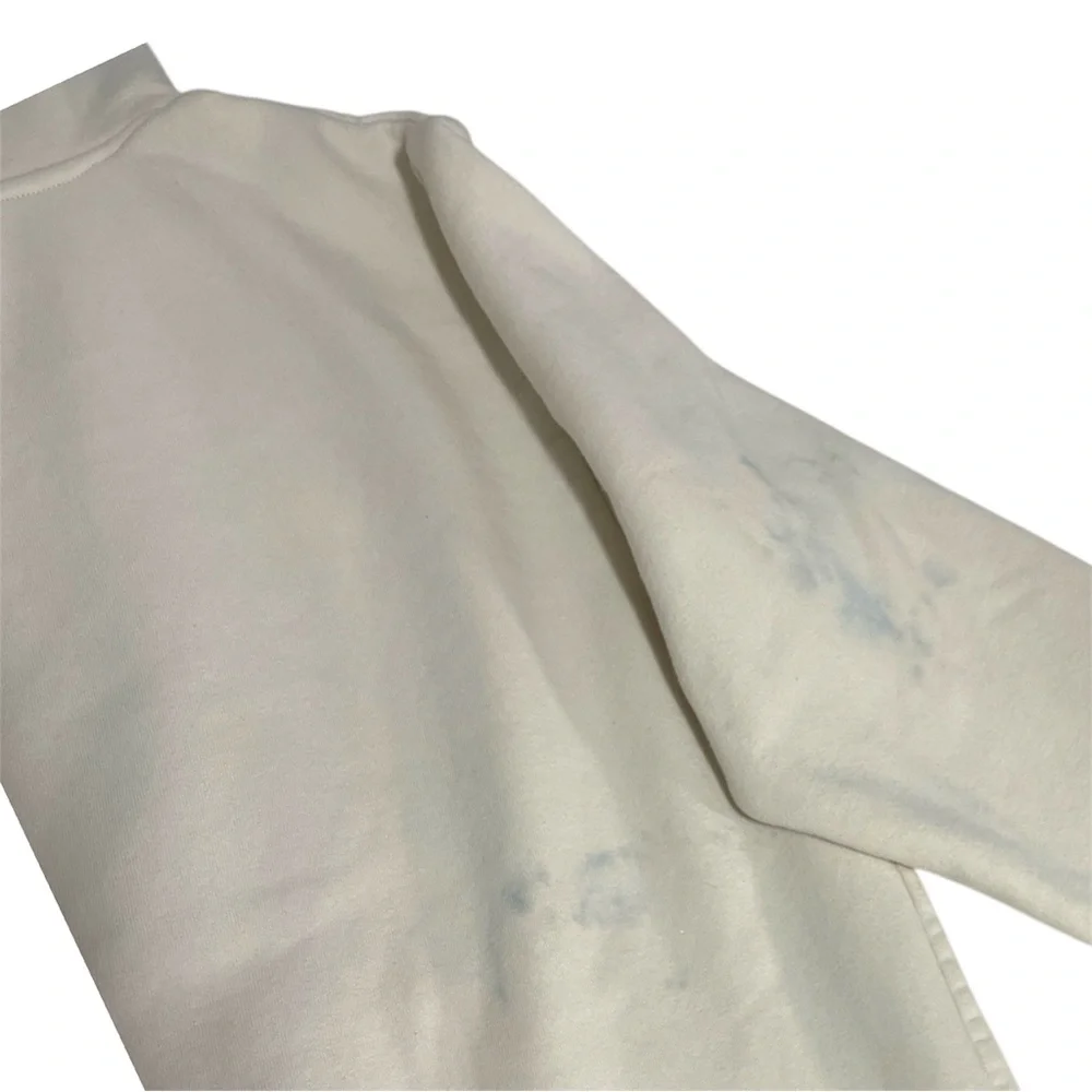 The North Face cream hoodie